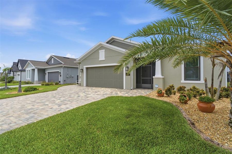 Front exterior of a new home in , Melbourne, FL, highlighting curb appeal (Image 1). Front exterior of a new home in , Melbourne, FL, highlighting curb appeal (Image 1).