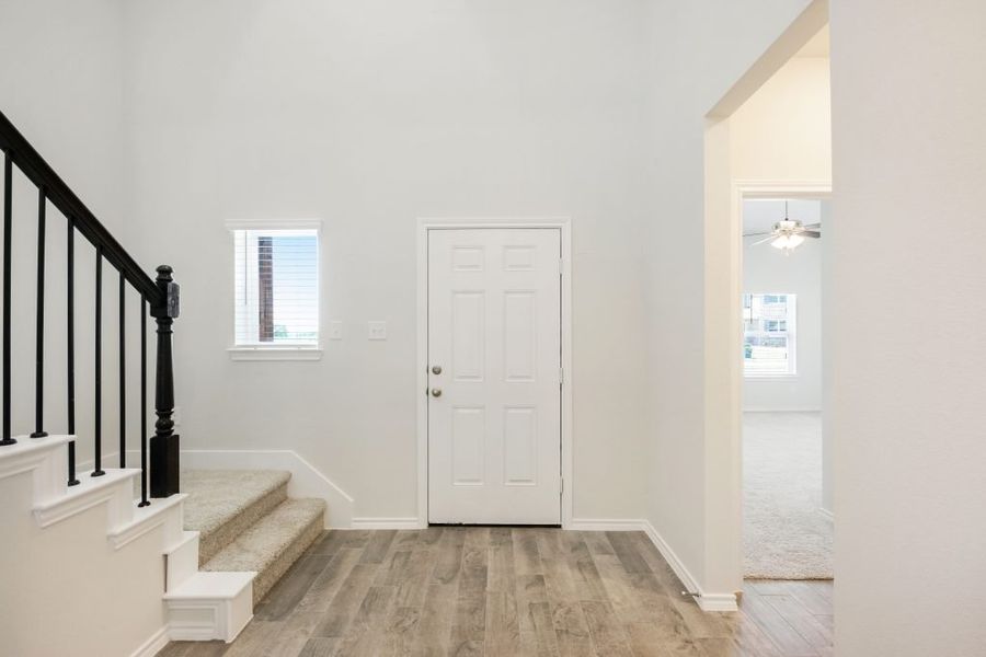 Representative exterior photo of a completed home built from the Lockhart by Impression Homes in Heartland, Heartland, TX (Image 16).