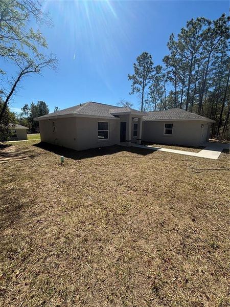 Exterior details and patio area of a home in , Citrus Springs (Image 25).