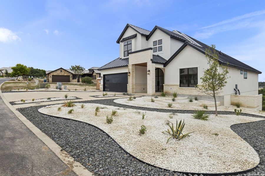 Front exterior of a new home in , Boerne, TX, highlighting curb appeal (Image 30).