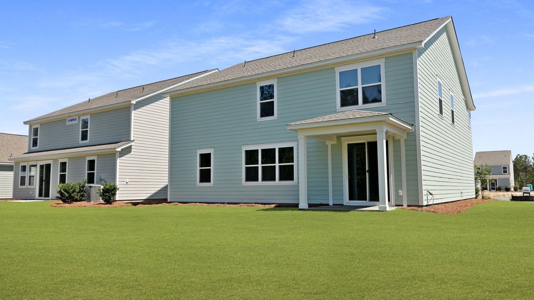 Front exterior of a new home in Sheep Island, Summerville, SC, highlighting curb appeal (Image 19).