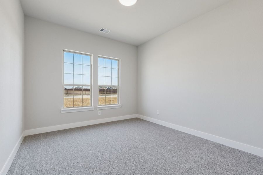 Representative unfurnished interior of a home built from the Halsted by Centre Living Homes in Ellis Ranch Estates, Waxahachie (Image 31).