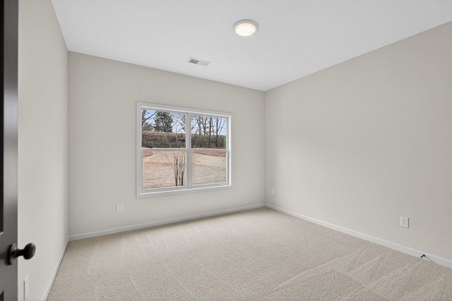Spacious, unfurnished interior of a new home in Blackwelder Bluff, Bowdon (Image 22).