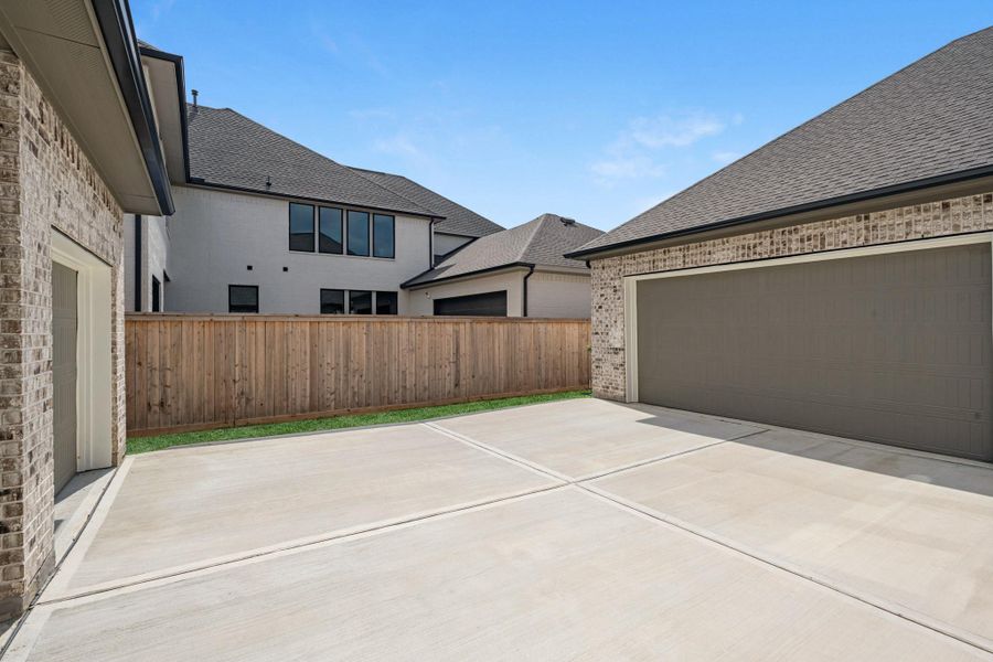Exterior details and patio area of a home in Bridgeland, Cypress (Image 25).