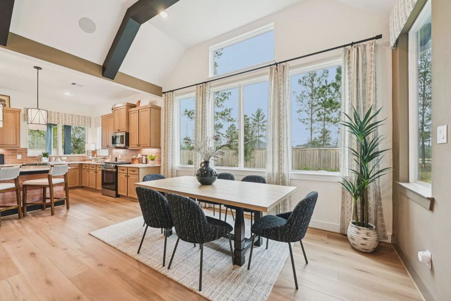 Representative furnished interior of a home built from the Tanlay by Chesmar Homes in The Woodland Hills Chateau, Willis (Image 4).