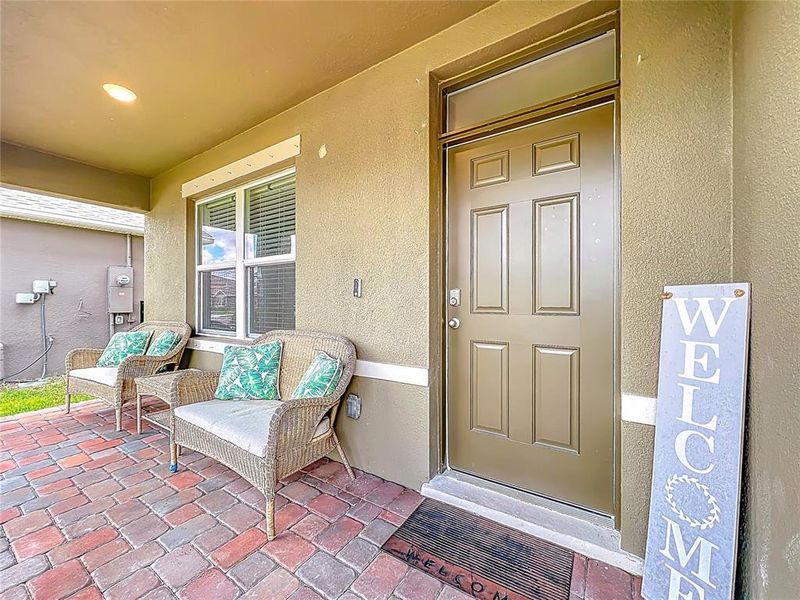 Exterior details and patio area of a home in Cypress Bay West, Palm Bay (Image 28).