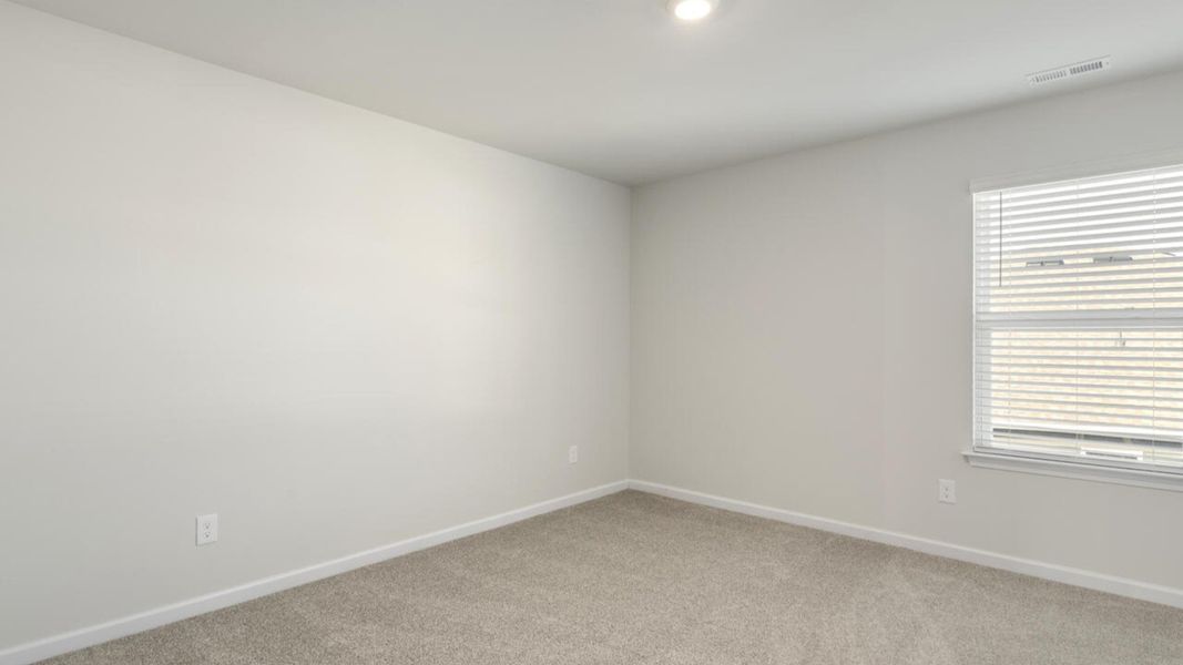 Spacious, unfurnished interior of a new home in The Preserve at Tidewater, Sneads Ferry (Image 39).