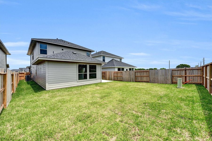 Front exterior of a new home in La Segarra 40', Brookshire, TX, highlighting curb appeal (Image 1). Front exterior of a new home in La Segarra 40', Brookshire, TX, highlighting curb appeal (Image 1).