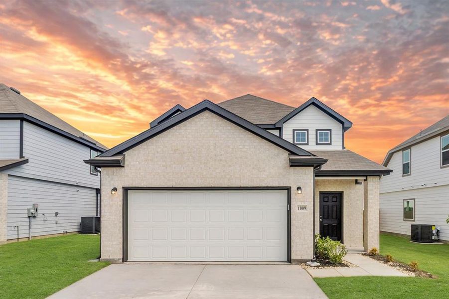 Front exterior of a new home in Retreat at Fossil Creek, Fort Worth, TX, highlighting curb appeal (Image 1). Front exterior of a new home in Retreat at Fossil Creek, Fort Worth, TX, highlighting curb appeal (Image 1).