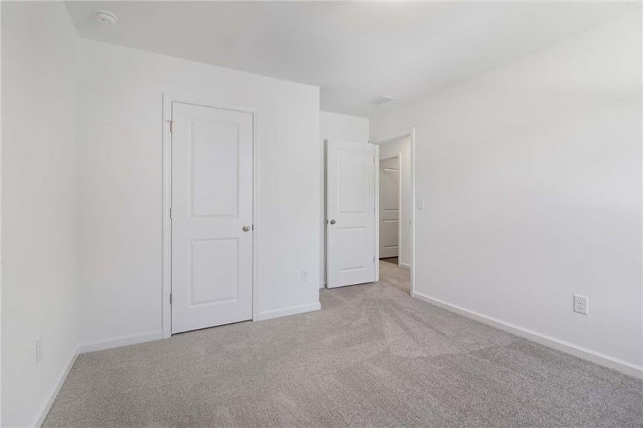 Spacious, unfurnished interior of a new home in The Pointe at Heron Bay, Locust Grove (Image 14).