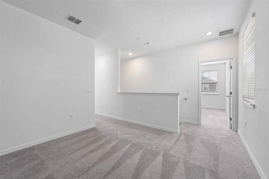 Spacious, unfurnished interior of a new home in Brack Ranch, St. Cloud (Image 30).