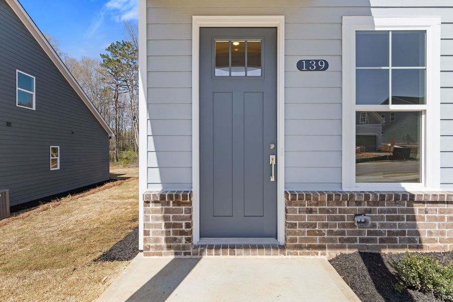 Representative exterior photo of a completed home built from the Stafford by Crawford Creek Communities in Red Bird Manor, Jefferson, GA (Image 26).