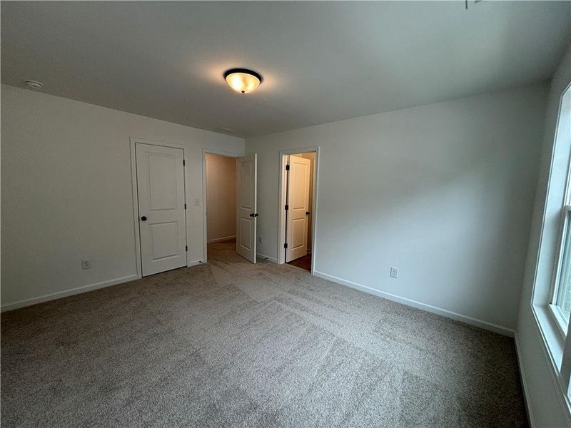 Spacious, unfurnished interior of a new home in Arbors at Richland Creek, Buford (Image 32).