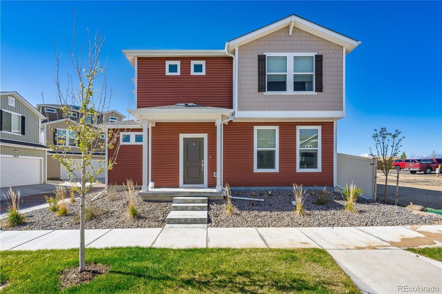 Front exterior of a new home in , Colorado Springs, CO, highlighting curb appeal (Image 18).
