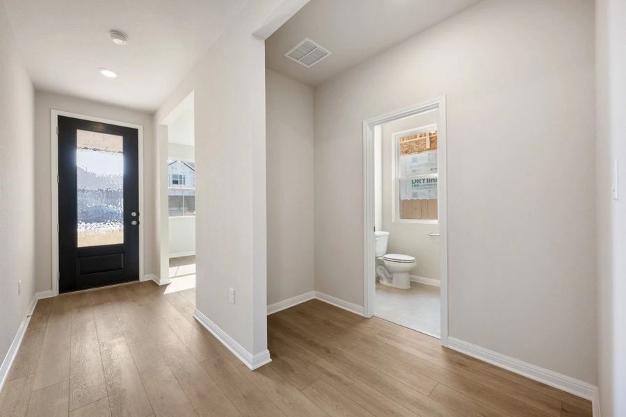 Spacious, unfurnished interior of a new home in The Colony, Bastrop (Image 22).