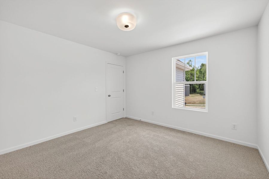 Spacious, unfurnished interior of a new home in Nathans Ridge, Lillington (Image 26).