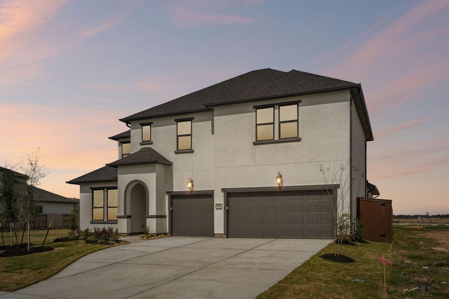 Front exterior of a new home in Del Bello Lakes 60', Manvel, TX, highlighting curb appeal (Image 26).