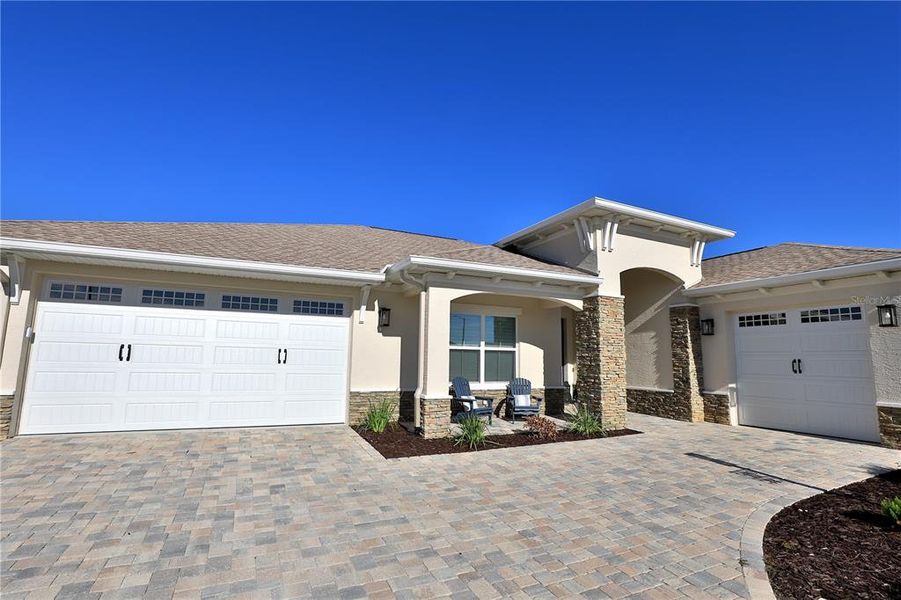 Front exterior of a new home in , Ocala, FL, highlighting curb appeal (Image 20).