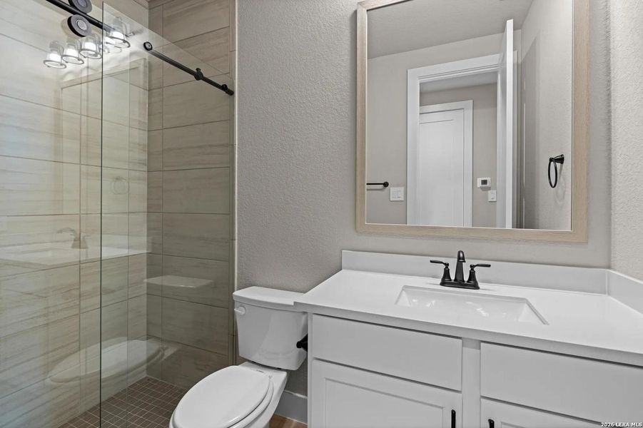 Furnished interior view inside a new home in Ventana - 60', Bulverde (Image 9).