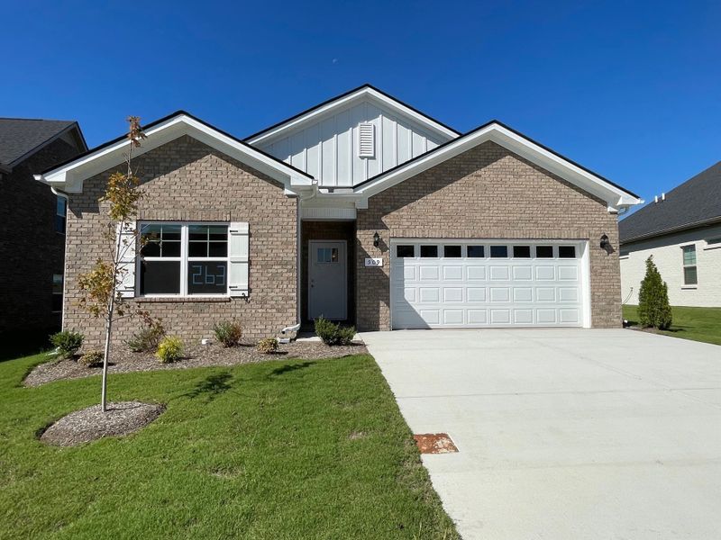 Front exterior of a new home in Brandon Woods, Spring Hill, TN, highlighting curb appeal (Image 1). Front exterior of a new home in Brandon Woods, Spring Hill, TN, highlighting curb appeal (Image 1).