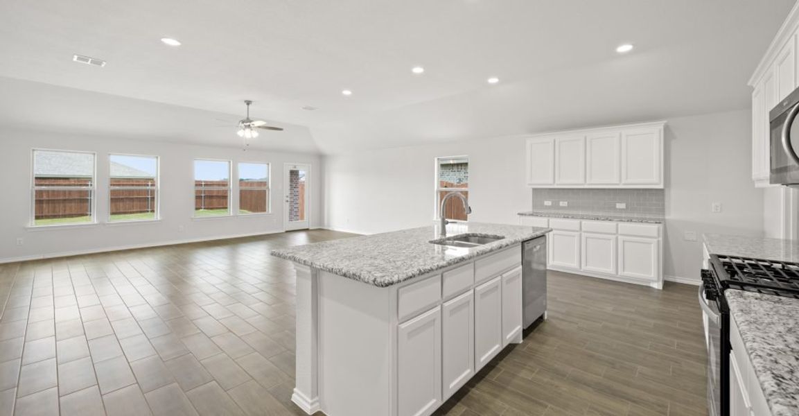 Representative exterior photo of a completed home built from the Lincoln by Impression Homes in Baker Farms, Cleburne, TX (Image 7).