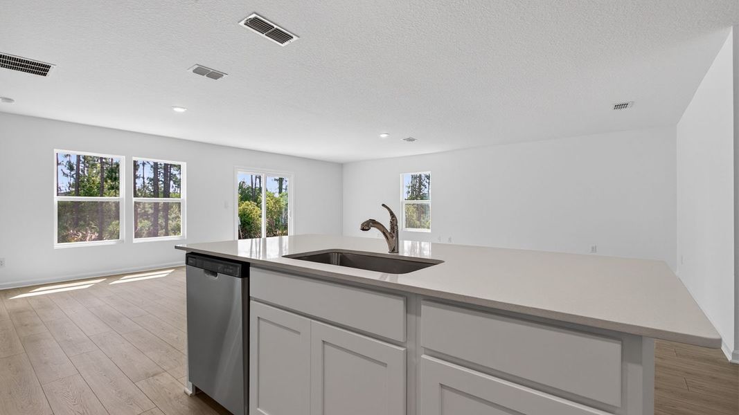 Representative furnished interior of a home built from the Aria+ by D.R. Horton in The Arbors, Jacksonville (Image 6).