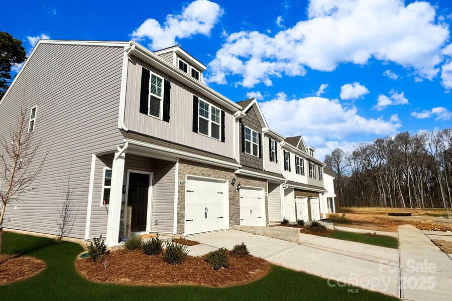 Front exterior of a new home in , Charlotte, NC, highlighting curb appeal (Image 2). Front exterior of a new home in , Charlotte, NC, highlighting curb appeal (Image 2).