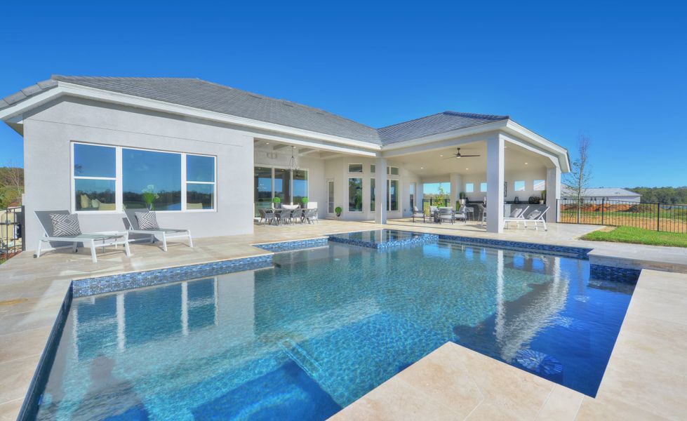 Exterior details and patio area of a home in West Hill Estates, Dade City (Image 30).