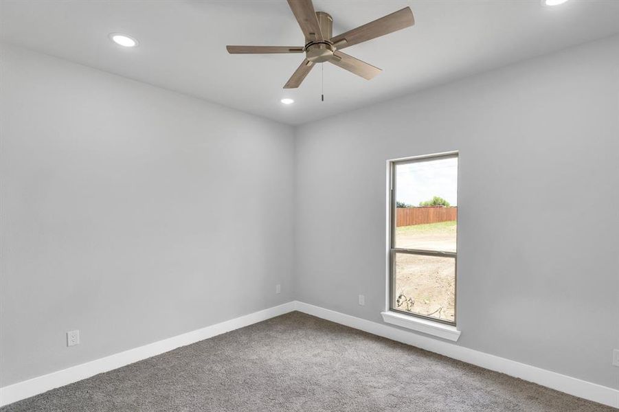 Unfurnished room with carpet flooring, recessed lighting, and ceiling fan