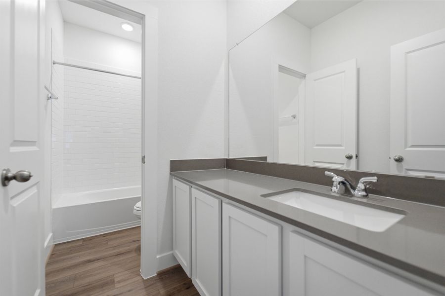 Furnished interior view inside a new home in Sanctuary, Salado (Image 6).