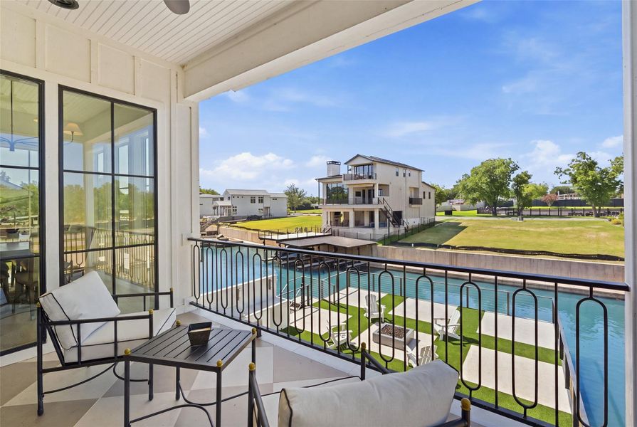 Unwind on the spacious balcony, taking in the panoramic views of the water and surrounding landscape. Unwind on the spacious balcony, taking in the panoramic views of the water and surrounding landscape.