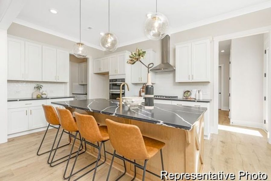 Representative furnished interior of a home built from the Bedford P by True Homes in Homecoming, Ravenel (Image 3).