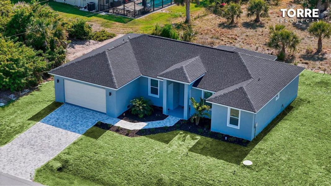 Front exterior of a new home in , Port Charlotte, FL, highlighting curb appeal (Image 2).
