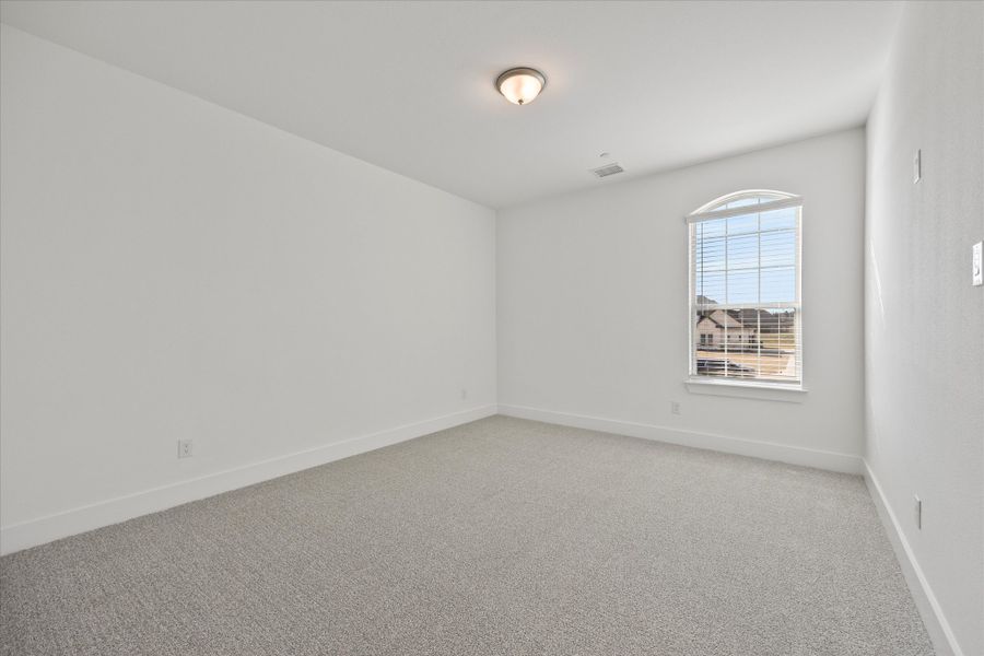 Representative unfurnished interior of a home built from the Davenport by Windsor Homes in Winding Creek, Rockwall (Image 35).