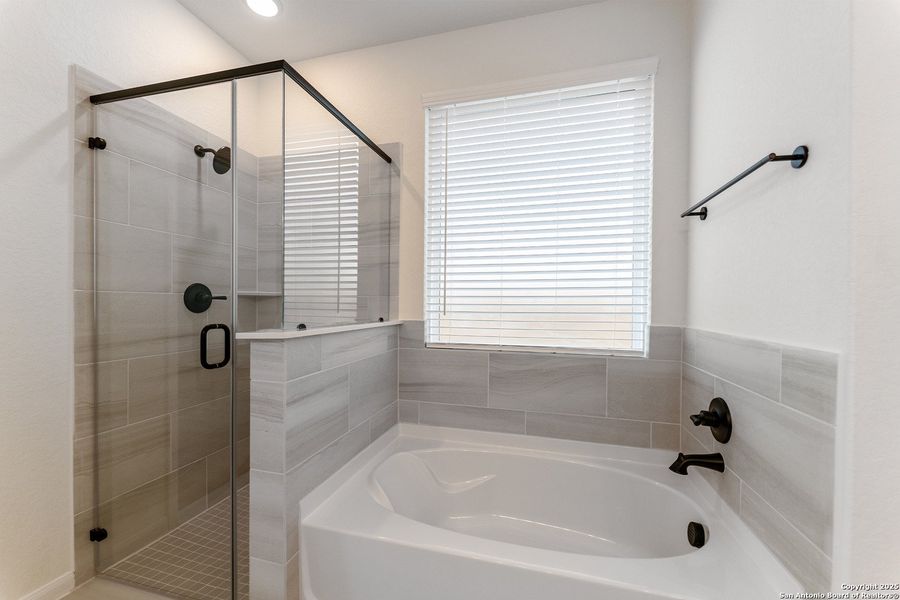 Furnished interior view inside a new home in The Woodlands at Medina Hills, Mico (Image 6).