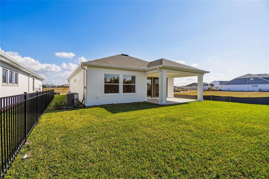 Exterior details and patio area of a home in Waterset Tradition Series, Apollo Beach (Image 22).