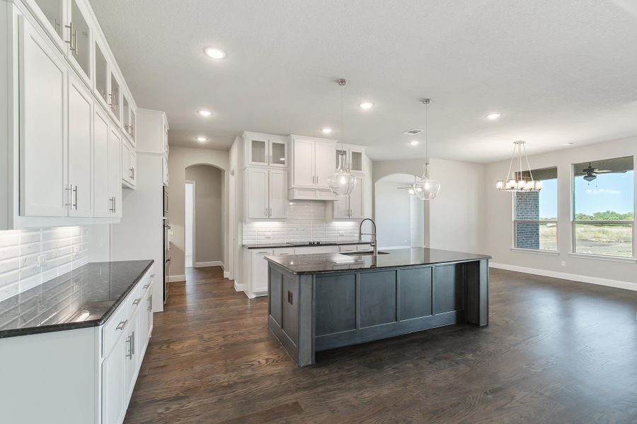 Kitchen | Concept 3634 at Hidden Creek Estates in Van Alstyne, TX by Landsea Homes