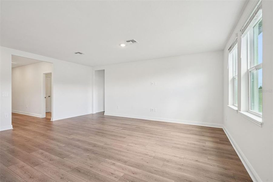 Spacious, unfurnished interior of a new home in The Reserve at Hammock Oaks - Signature Series, Lady Lake (Image 27).