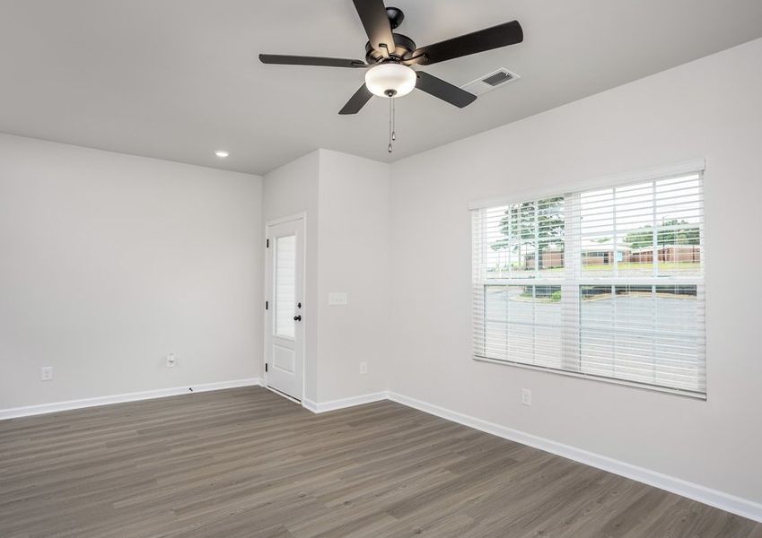Windows let in lots of light to the living room.