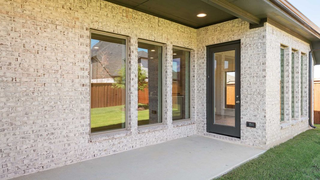 Representative exterior details of a home built from the 2187W by Perry Homes in Veramendi, New Braunfels (Image 4).
