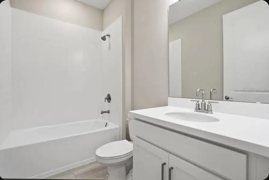 Furnished interior view inside a new home in Coasterra Community Group Page, Palmetto (Image 4).