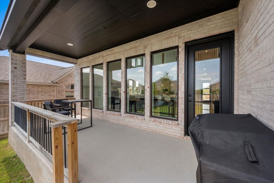 A spacious covered patio provides a delightful outdoor living extension to this attractive brick home. A spacious covered patio provides a delightful outdoor living extension to this attractive brick home.