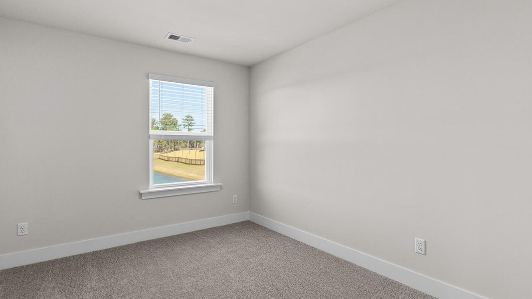Spacious, unfurnished interior of a new home in The Haven at Indigo Preserve, Leland (Image 29).