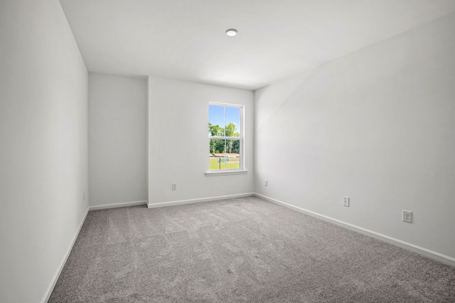 Spacious, unfurnished interior of a new home in Michaux Gardens, Belmont (Image 55).
