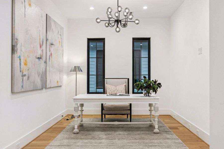 Upstairs Media Room, Study or Lounge, the possibilities are endless. There is a Conduit on the wall for a TV and a 13-Light Sputnik Modern Linear Glass Bubble Chandelier.