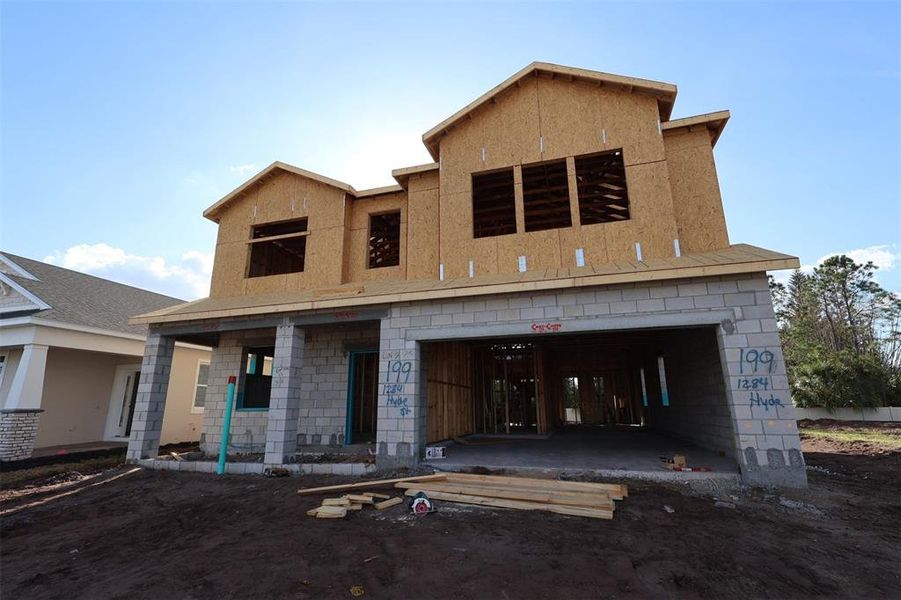 In-progress construction of a new home in Center Lake on the Park, St. Cloud, FL (Image 7).