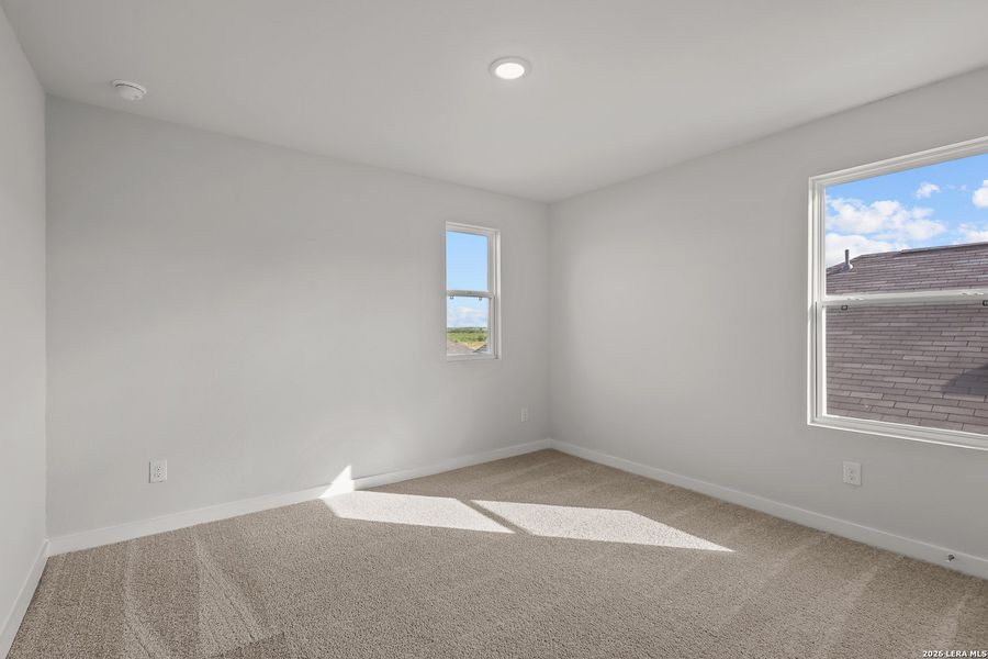 Spacious, unfurnished interior of a new home in Agave, San Antonio (Image 14).