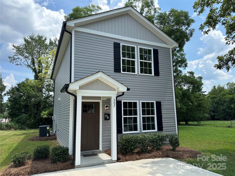 Front exterior of a new home in , Salisbury, NC, highlighting curb appeal (Image 1). Front exterior of a new home in , Salisbury, NC, highlighting curb appeal (Image 1).