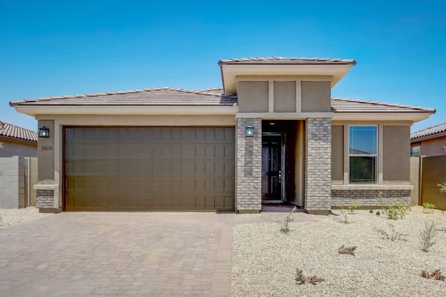 Representative exterior photo of a completed home built from the Castillo Series - Acacia by Brightland Homes in Castillo at Anderson Parc, Buckeye, AZ (Image 26). Representative exterior photo of a completed home built from the Castillo Series - Acacia by Brightland Homes in Castillo at Anderson Parc, Buckeye, AZ (Image 26).