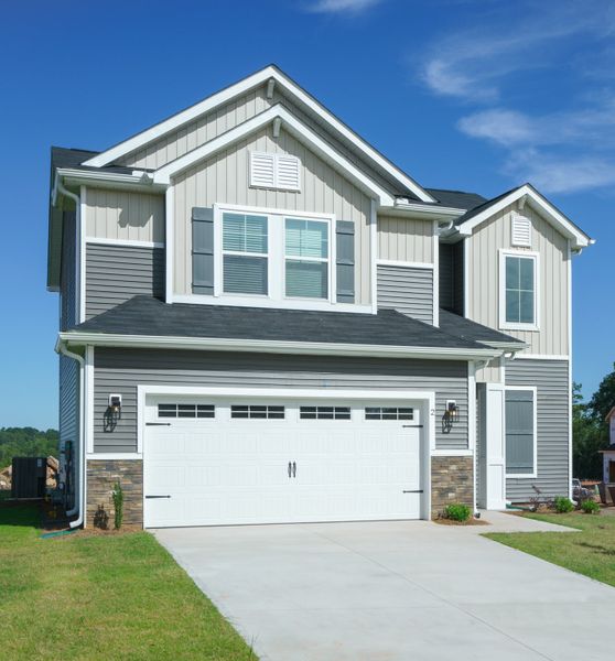 Representative exterior photo of a completed home built from the The Kennedy by Cothran Homes in Holly Ridge, Greenville, SC (Image 27).